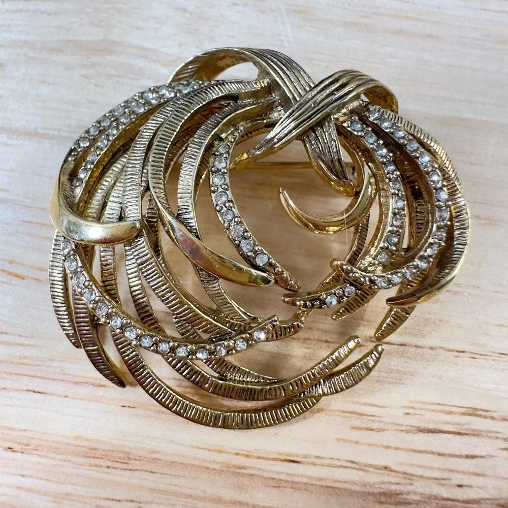 Vintage Monet Gold Tone Etched Swirl Rhinestone Brooch Signed BEAUTY